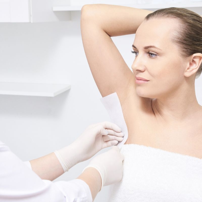 A woman getting her underarms waxed- An Overview Of Beauty Treatments At Popular Spas
