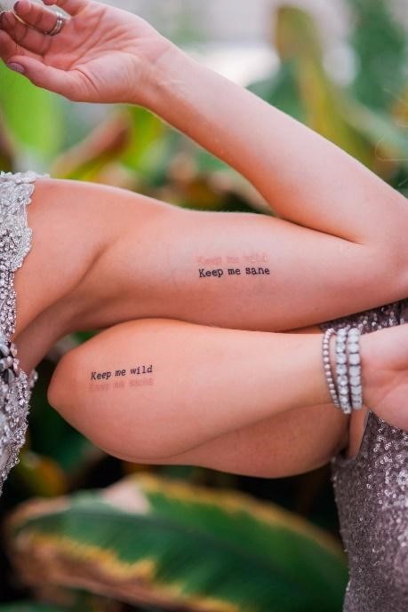 Keep me wild, keep me sane quote tattoo on the arms of mother and daughter as an inspiration for mother daughter tattoos- ZeroKaata Studio