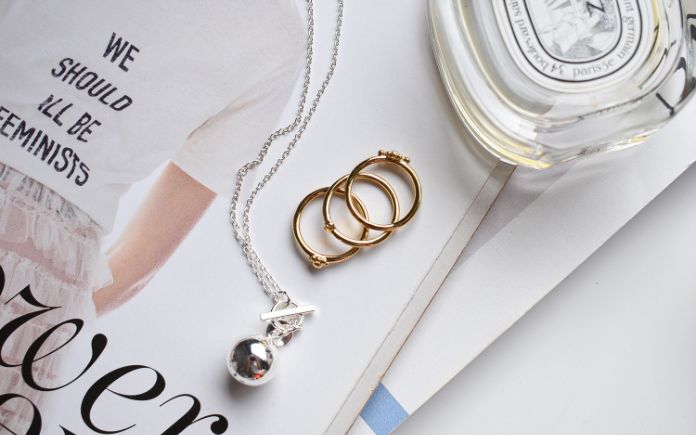 gold rings and silver necklace
