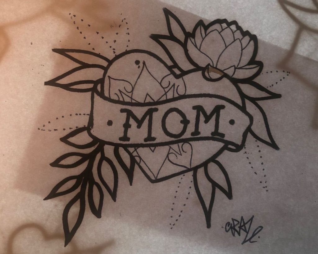 An elaborate Mom heart tattoo as an inspiration for heart for tattoo designs for you