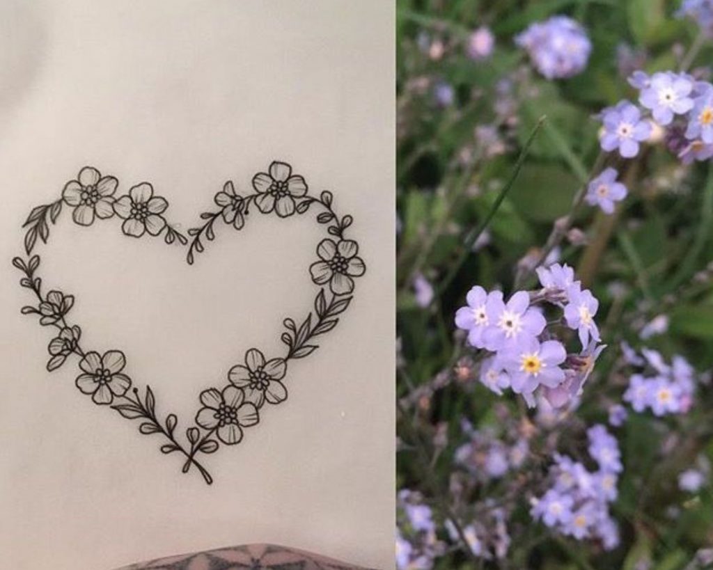 A heart tattoo with forget me not flowers as an inspiration for heart for tattoo designs for you